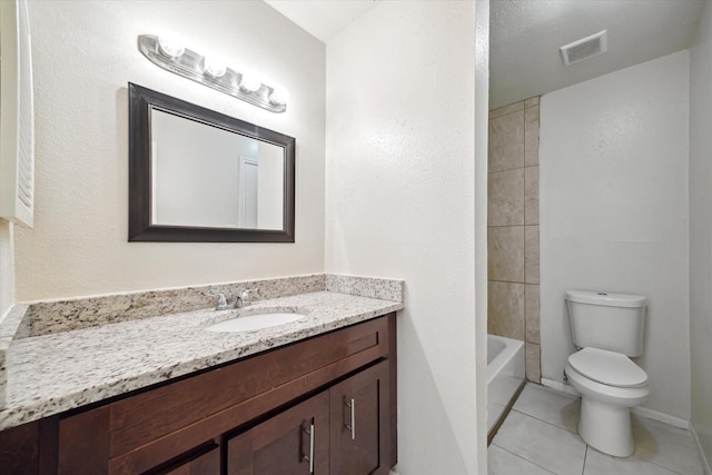 12318-12320 Ormandy St, Houston, TX 77085 - bathroom featuring vanity, toilet, tile patterned floors, and  shower combination