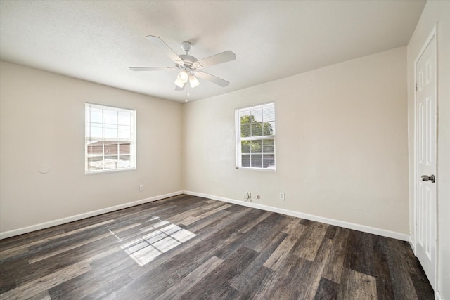 12318-12320 Ormandy St, Houston, TX 77085 - unfurnished room with dark wood finished floors, ceiling fan, and baseboards