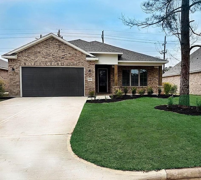 3522 Stonehenge, Montgomery, TX 77356 - view of front facade featuring an attached garage, brick siding, concrete driveway, a front lawn, and roof with shingles