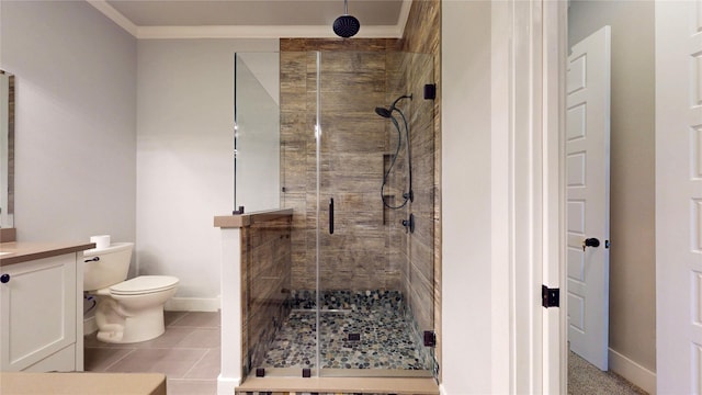 2414 Sand Drift Ln, Crystal Beach, TX 77650 - full bathroom featuring vanity, a stall shower, toilet, crown molding, and baseboards