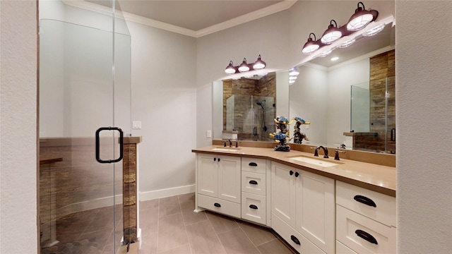 2414 Sand Drift Ln, Crystal Beach, TX 77650 - bathroom featuring ornamental molding, a stall shower, double vanity, tile patterned flooring, and baseboards