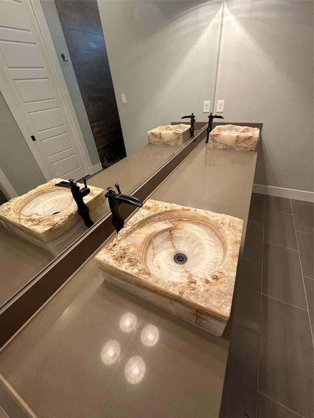 2414 Sand Drift Ln, Crystal Beach, TX 77650 - bathroom featuring vanity and baseboards