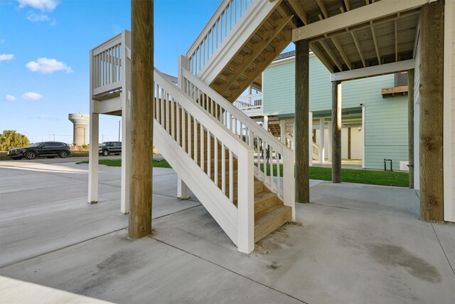 4046 Miramar Ct, Galveston, TX 77554 - view of patio / terrace featuring stairway