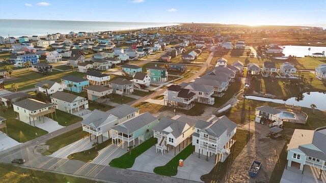 4046 Miramar Ct, Galveston, TX 77554 - aerial view of residential area featuring a nearby body of water
