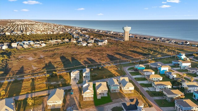 4046 Miramar Ct, Galveston, TX 77554 - aerial overview of property's location featuring nearby suburban area and a large body of water