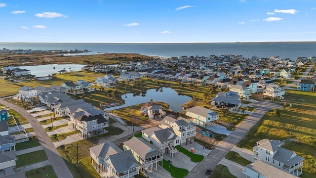 4046 Miramar Ct, Galveston, TX 77554 - aerial view of property and surrounding area featuring nearby suburban area and a large body of water