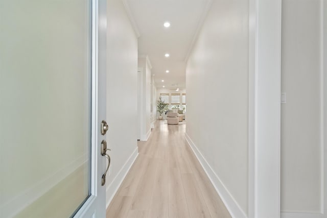 4046 Miramar Ct, Galveston, TX 77554 - hallway featuring ornamental molding, light wood finished floors, recessed lighting, and baseboards