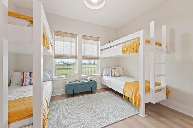 4046 Miramar Ct, Galveston, TX 77554 - bedroom with wood finished floors and baseboards