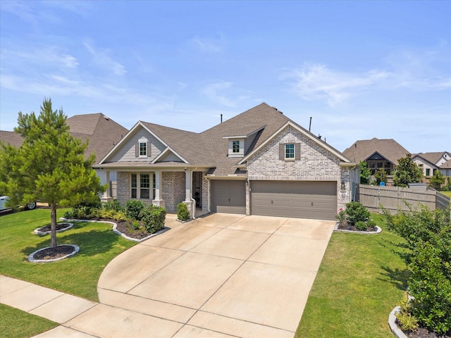 17511 Autumn Leaves Dr, Conroe, TX 77302 - craftsman house with brick siding, concrete driveway, an attached garage, covered porch, and roof with shingles