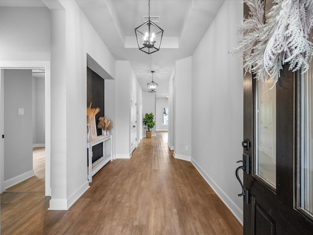17511 Autumn Leaves Dr, Conroe, TX 77302 - entrance foyer featuring a chandelier, wood finished floors, and baseboards