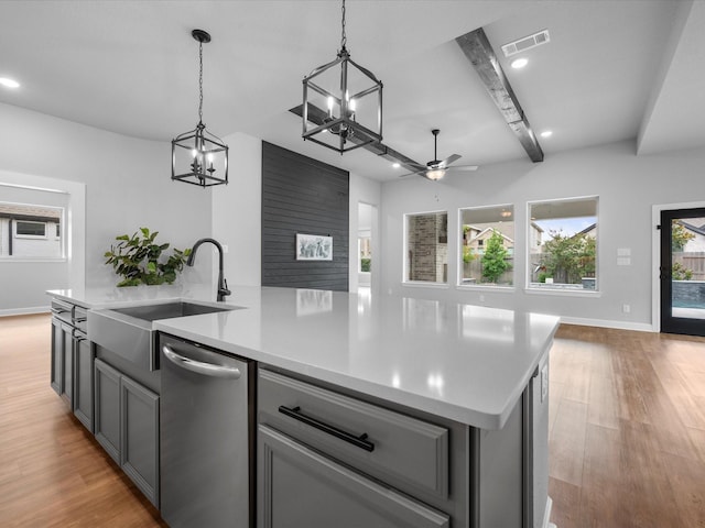 17511 Autumn Leaves Dr, Conroe, TX 77302 - kitchen with dishwasher, a chandelier, a sink, open floor plan, and ceiling fan
