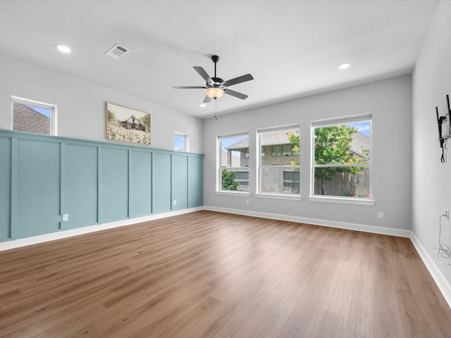 17511 Autumn Leaves Dr, Conroe, TX 77302 - spare room featuring wood finished floors, ceiling fan, recessed lighting, and baseboards