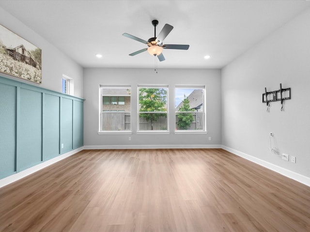 17511 Autumn Leaves Dr, Conroe, TX 77302 - spare room featuring light wood-style floors, baseboards, a ceiling fan, and recessed lighting