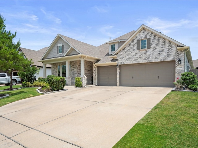 17511 Autumn Leaves Dr, Conroe, TX 77302 - view of front of home with brick siding, driveway, a front yard, roof with shingles, and an attached garage