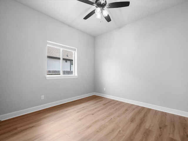 17511 Autumn Leaves Dr, Conroe, TX 77302 - spare room featuring light wood finished floors, baseboards, and a ceiling fan