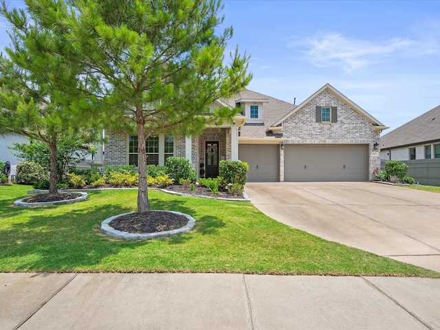 17511 Autumn Leaves Dr, Conroe, TX 77302 - view of front facade featuring brick siding, driveway, a front lawn, and an attached garage