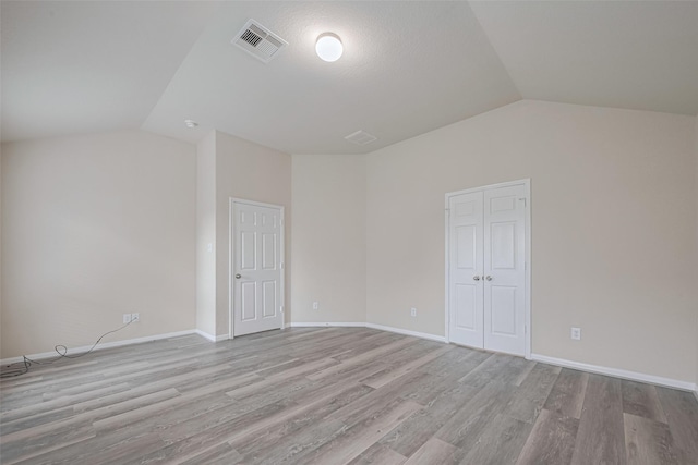 3423 Single Ridge Way, Katy, TX 77493 - additional living space featuring lofted ceiling, light wood-style floors, and baseboards