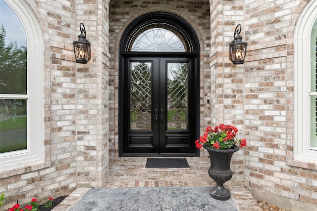 2722 N Southern Oaks Dr, Houston, TX 77068 - property entrance with french doors and brick siding