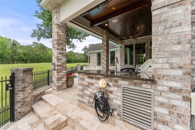 2722 N Southern Oaks Dr, Houston, TX 77068 - view of patio / terrace with a sink and a ceiling fan