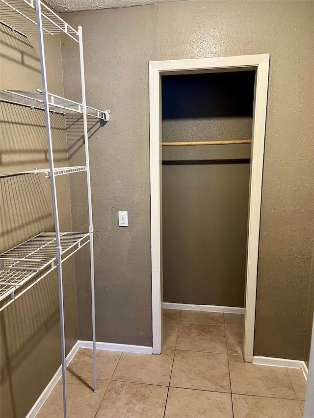2503 Ironclad Dr, League City, TX 77573 - walk in closet featuring tile patterned flooring