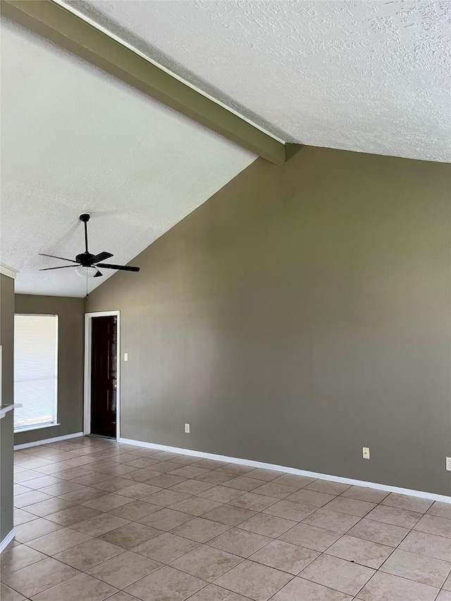 2503 Ironclad Dr, League City, TX 77573 - spare room featuring a textured ceiling, light tile patterned floors, baseboards, and ceiling fan
