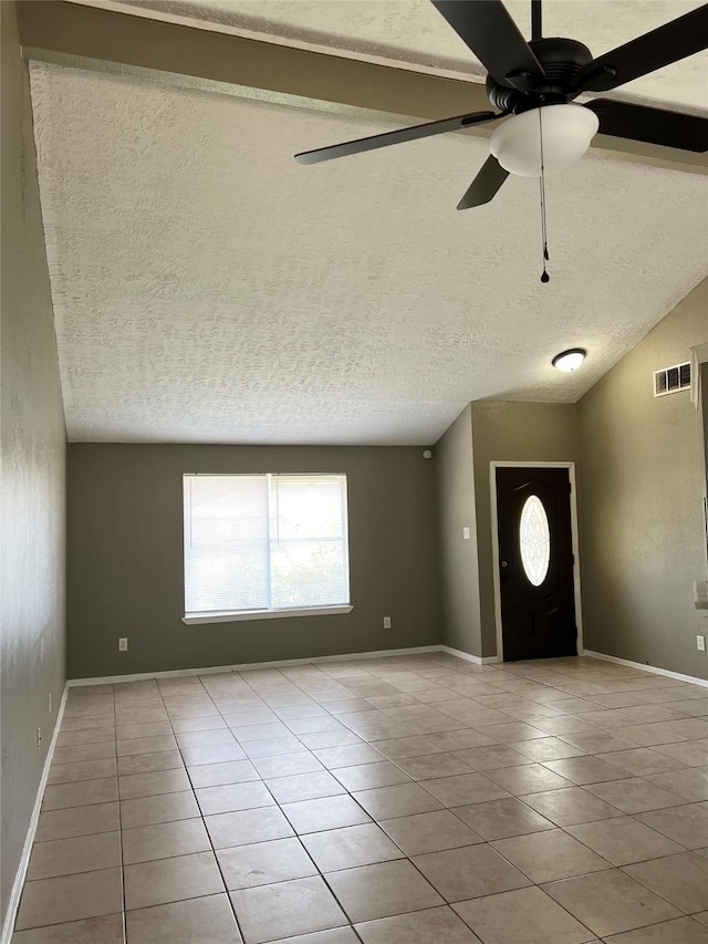 2503 Ironclad Dr, League City, TX 77573 - tiled empty room with a textured ceiling, ceiling fan, and baseboards