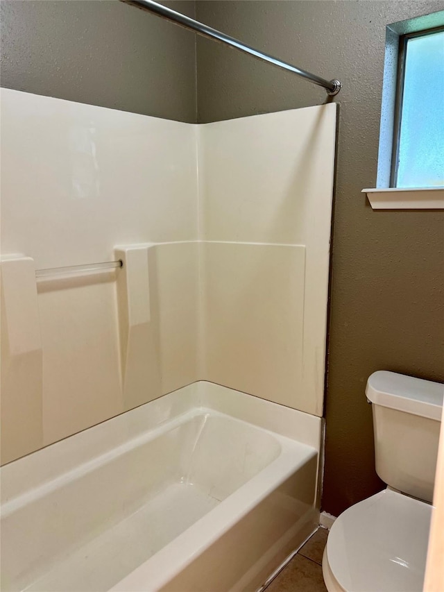 2503 Ironclad Dr, League City, TX 77573 - full bathroom with toilet and tile patterned floors