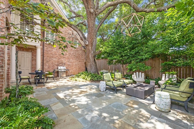 3428 Wickersham Ln, Houston, TX 77027 - view of patio with a fire pit and a grill