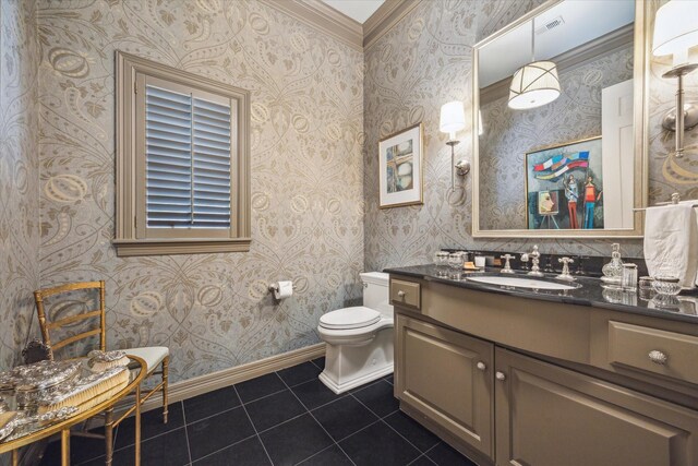 3428 Wickersham Ln, Houston, TX 77027 - bathroom with tile patterned floors, baseboards, vanity, toilet, and crown molding