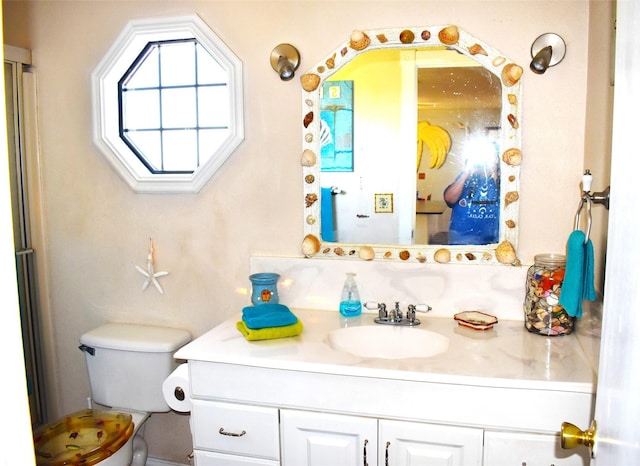 26656 Fm 457, Sargent, TX 77414 - bathroom featuring vanity and toilet