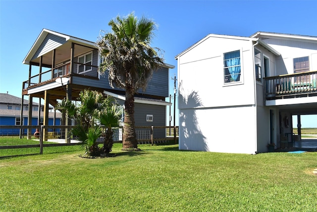 26656 Fm 457, Sargent, TX 77414 - rear view of house with a balcony