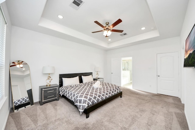 8034 Royal Palm Dr, Fulshear, TX 77441 - bedroom featuring a raised ceiling, carpet, recessed lighting, baseboards, and ensuite bath