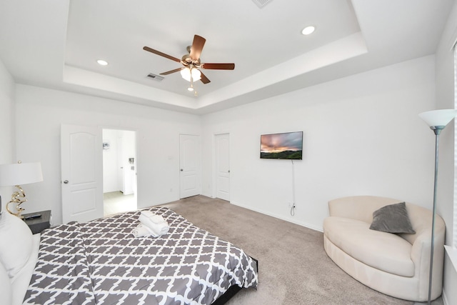 8034 Royal Palm Dr, Fulshear, TX 77441 - bedroom with carpet floors, a raised ceiling, recessed lighting, a ceiling fan, and baseboards