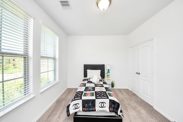 8034 Royal Palm Dr, Fulshear, TX 77441 - bedroom with light carpet and baseboards