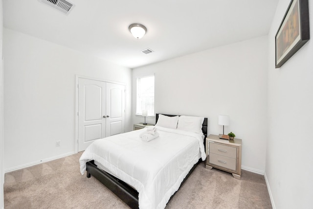8034 Royal Palm Dr, Fulshear, TX 77441 - bedroom featuring light colored carpet, baseboards, and a closet
