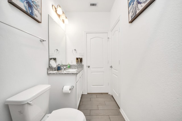 8034 Royal Palm Dr, Fulshear, TX 77441 - bathroom featuring toilet, vanity, and tile patterned flooring