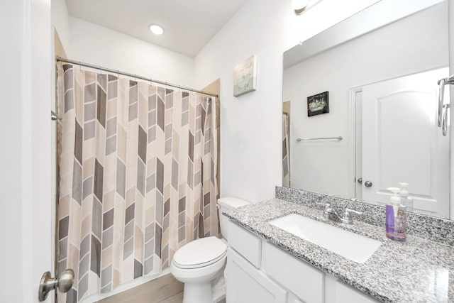 8034 Royal Palm Dr, Fulshear, TX 77441 - full bathroom with toilet, vanity, and a shower with curtain