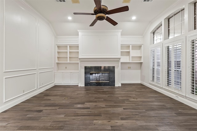 4206 Misty Timbers Way, Houston, TX 77345 - unfurnished living room featuring a ceiling fan, a fireplace, dark wood-style flooring, built in features, and recessed lighting