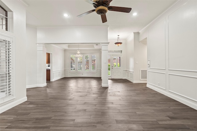 4206 Misty Timbers Way, Houston, TX 77345 - unfurnished living room featuring a decorative wall, ornamental molding, ceiling fan, recessed lighting, and dark wood-style flooring