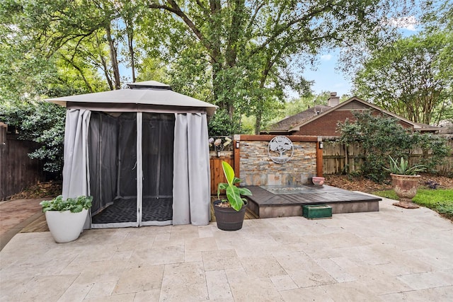 4206 Misty Timbers Way, Houston, TX 77345 - fenced backyard featuring a gazebo and a patio area
