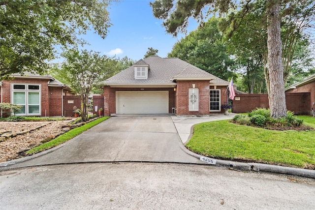 4206 Misty Timbers Way, Houston, TX 77345 - traditional home featuring brick siding, an attached garage, and concrete driveway