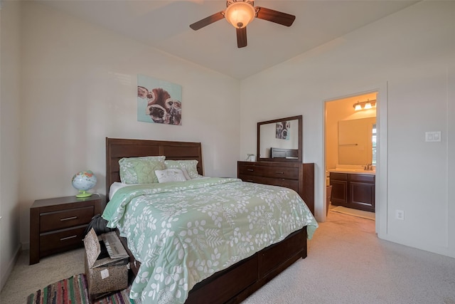 27003 Lindenwood Creek Ln, Katy, TX 77494 - bedroom with light carpet, ensuite bath, baseboards, and ceiling fan