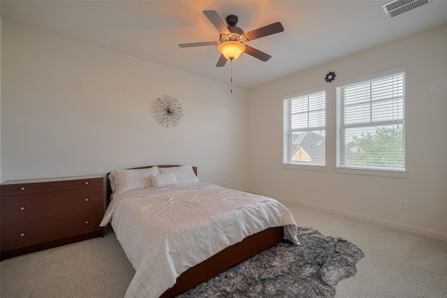 27003 Lindenwood Creek Ln, Katy, TX 77494 - carpeted bedroom with multiple windows, baseboards, and a ceiling fan