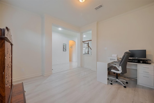 27003 Lindenwood Creek Ln, Katy, TX 77494 - home office featuring arched walkways, light wood-style flooring, ornamental molding, and baseboards