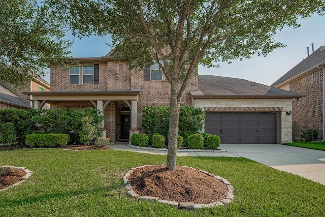 27003 Lindenwood Creek Ln, Katy, TX 77494 - traditional home featuring driveway, a front lawn, an attached garage, and brick siding