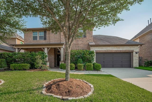 27003 Lindenwood Creek Ln, Katy, TX 77494 - traditional home with brick siding, a front yard, driveway, and an attached garage