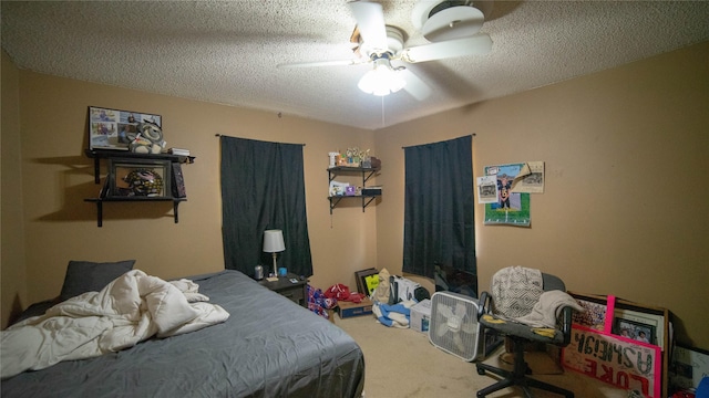 205 Mesa Dr, Gatesville, TX 76528 - bedroom featuring carpet flooring, a textured ceiling, and ceiling fan