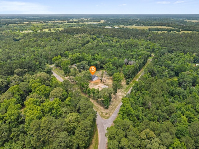 71 Prescott Dr, New Waverly, TX 77358 - aerial view of property and surrounding area featuring a forest