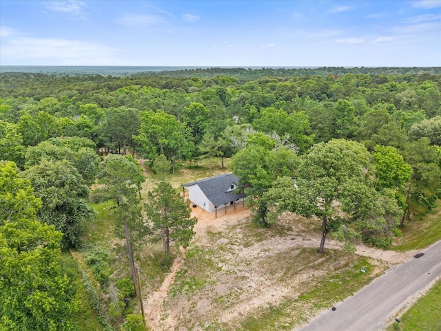 71 Prescott Dr, New Waverly, TX 77358 - view from above of property featuring a forest