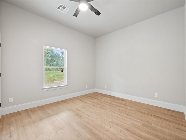 71 Prescott Dr, New Waverly, TX 77358 - unfurnished room with wood finished floors, ceiling fan, and baseboards